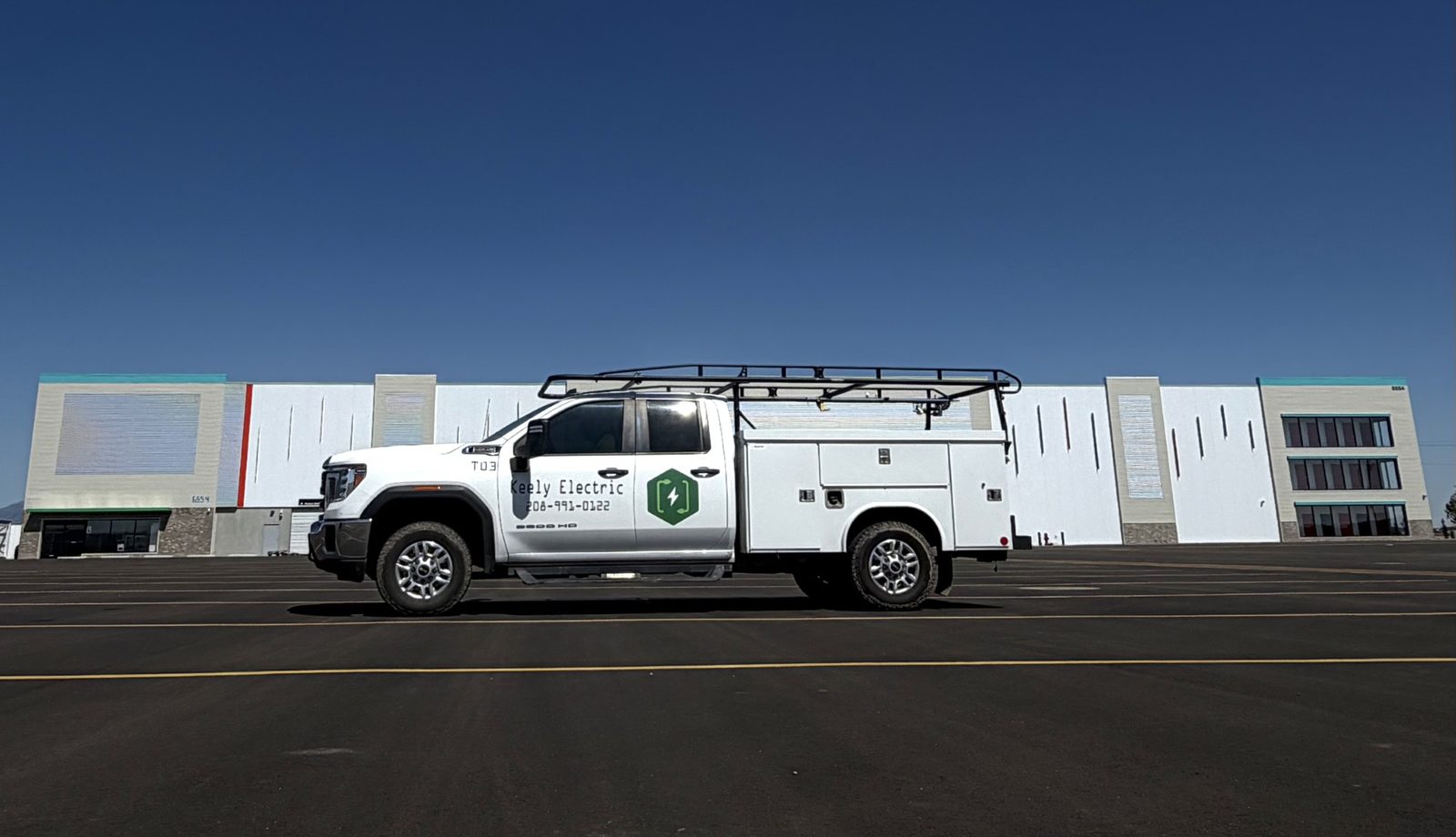 Keely Electric service truck outside a commercial building